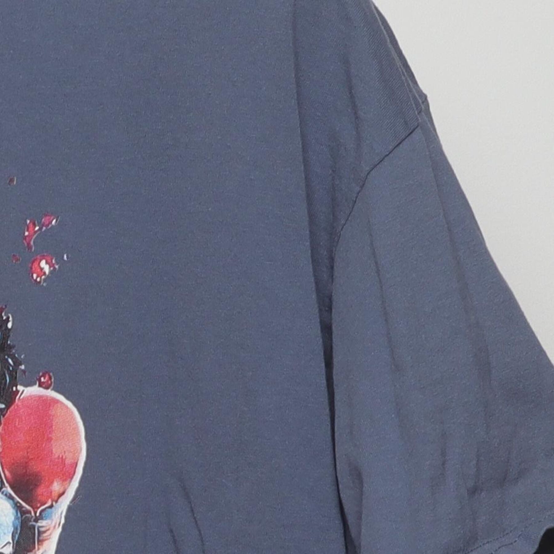 Close-up of the single stitch sleeve on the Vintage Y2K Horror Movie Villains "Most Wonderful Time Of The Year" T-Shirt - L