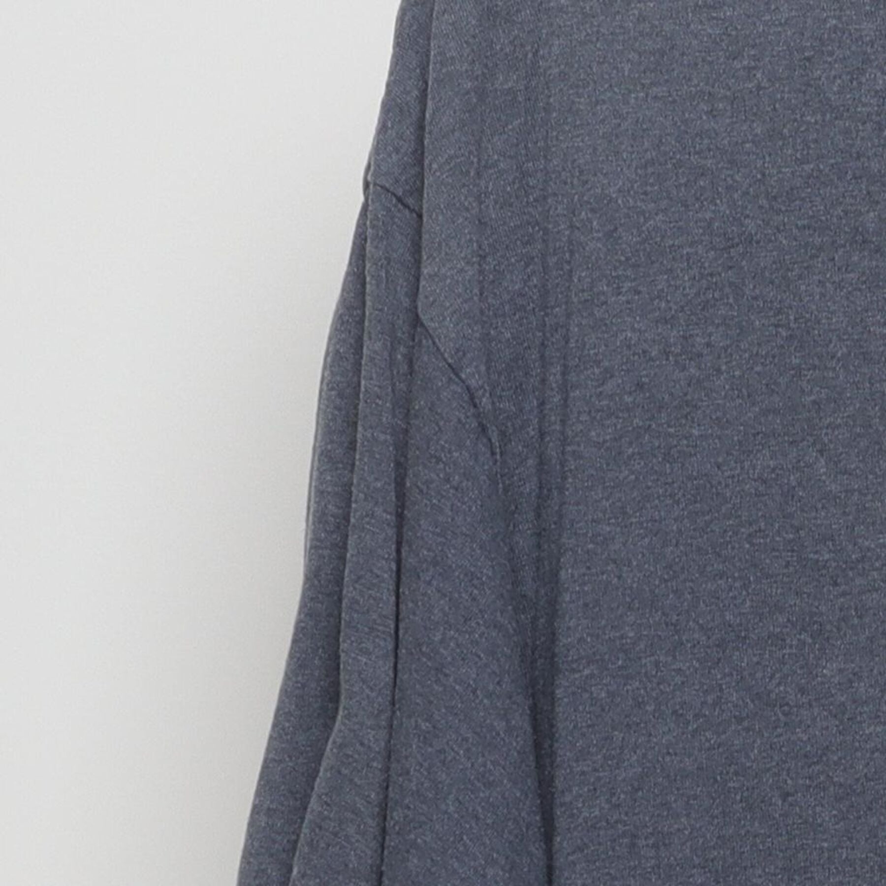 Close-up of the Left sleeve on the Vintage Y2K Unleash Break "Tribal Logo" T-Shirt - L