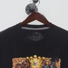 Close-up of the collar and tag on the Vintage Y2K Marc Ecko "Lost in Wonderland" T-Shirt - L