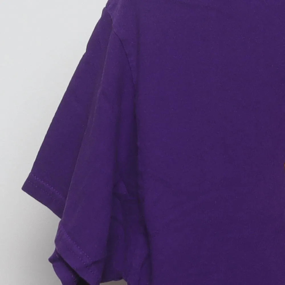 Close-up of the sleeve on the Vintage Y2K McDonald's "Rainbow Fries" T-Shirt - M