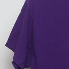 Close-up of the sleeve on the Vintage Y2K McDonald's "Rainbow Fries" T-Shirt - M