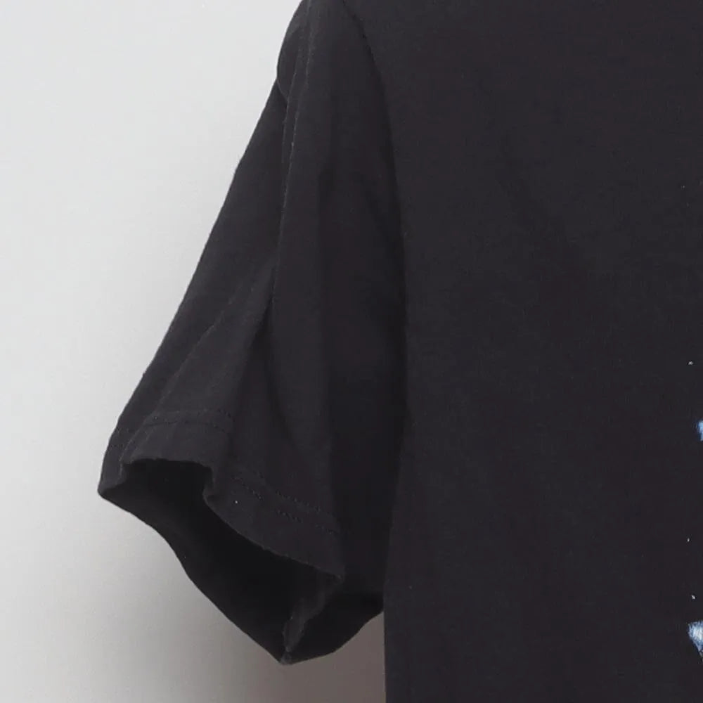 Close-up of the sleeve on the Vintage Y2K Michael Jackson "Moonwalker" T-Shirt - M