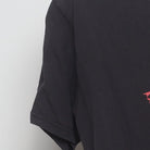 Close-up of the sleeve on the Vintage Y2K Michael Jackson "Thriller Zombie" T-Shirt - M