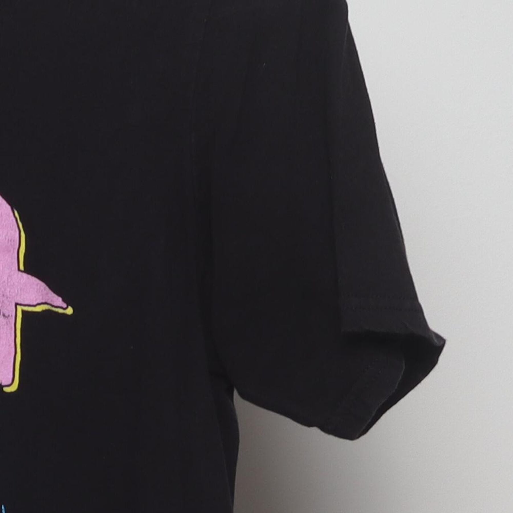 Close-up of the Right sleeve on the Vintage Y2K Naruto Shippuden "Rasengan Attack" T-Shirt - XS