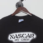 Close-up of the collar and tag on the Vintage Y2K NASCAR "Pit Crew" T-Shirt - L