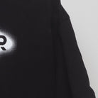 Close-up of the Right sleeve on the Vintage Y2K NASCAR "Pit Crew" T-Shirt - L
