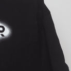 Close-up of the Right sleeve on the Vintage Y2K NASCAR "Pit Crew" T-Shirt - L