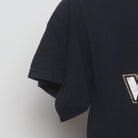 Close-up of the Left sleeve on the Vintage Y2K New Orleans Saints "Who Dat?" T-Shirt - XS