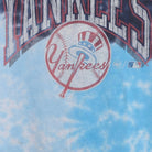 Close-up of the main graphic on the Vintage Y2K New York Yankees "Tie-Dye Logo" T-Shirt - XS