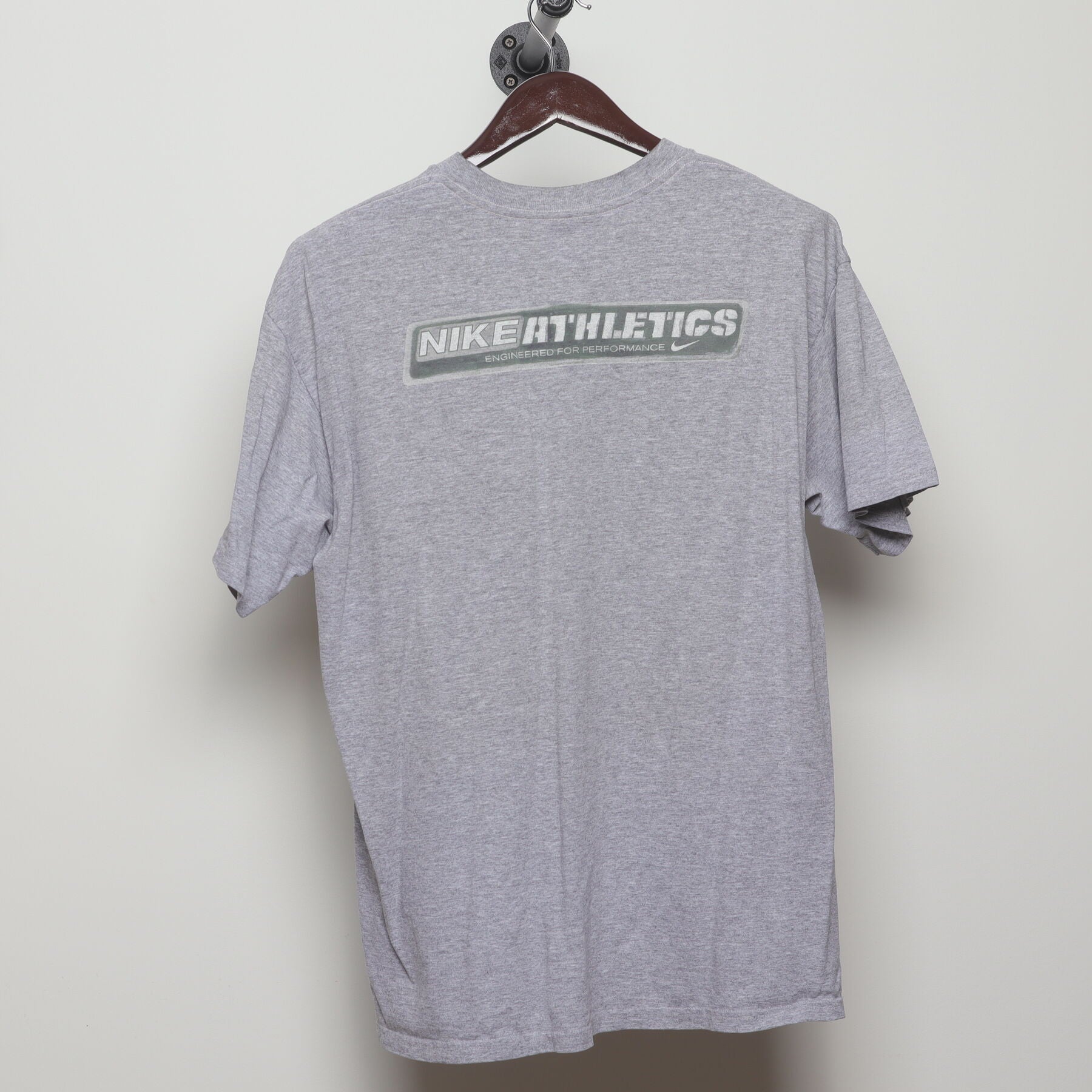 Back view of Vintage Y2K Nike "Athletics Engineered for Performance" T-Shirt - L