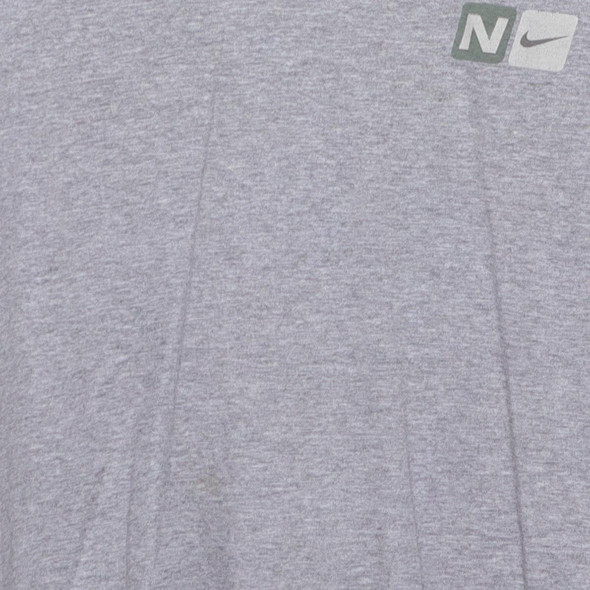 Close-up of the main graphic on the Vintage Y2K Nike "Athletics Engineered for Performance" T-Shirt - L