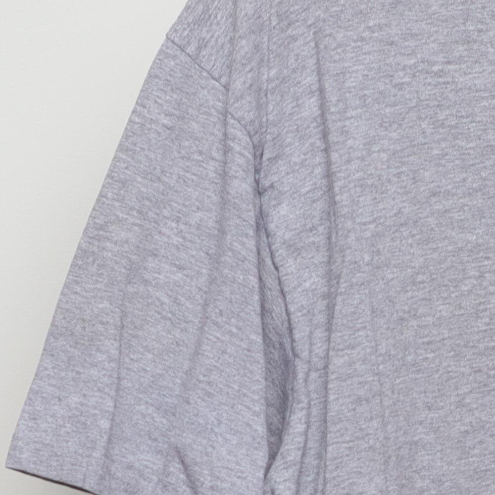 Close-up of the sleeve on the Vintage Y2K Nike "Athletics Engineered for Performance" T-Shirt - L
