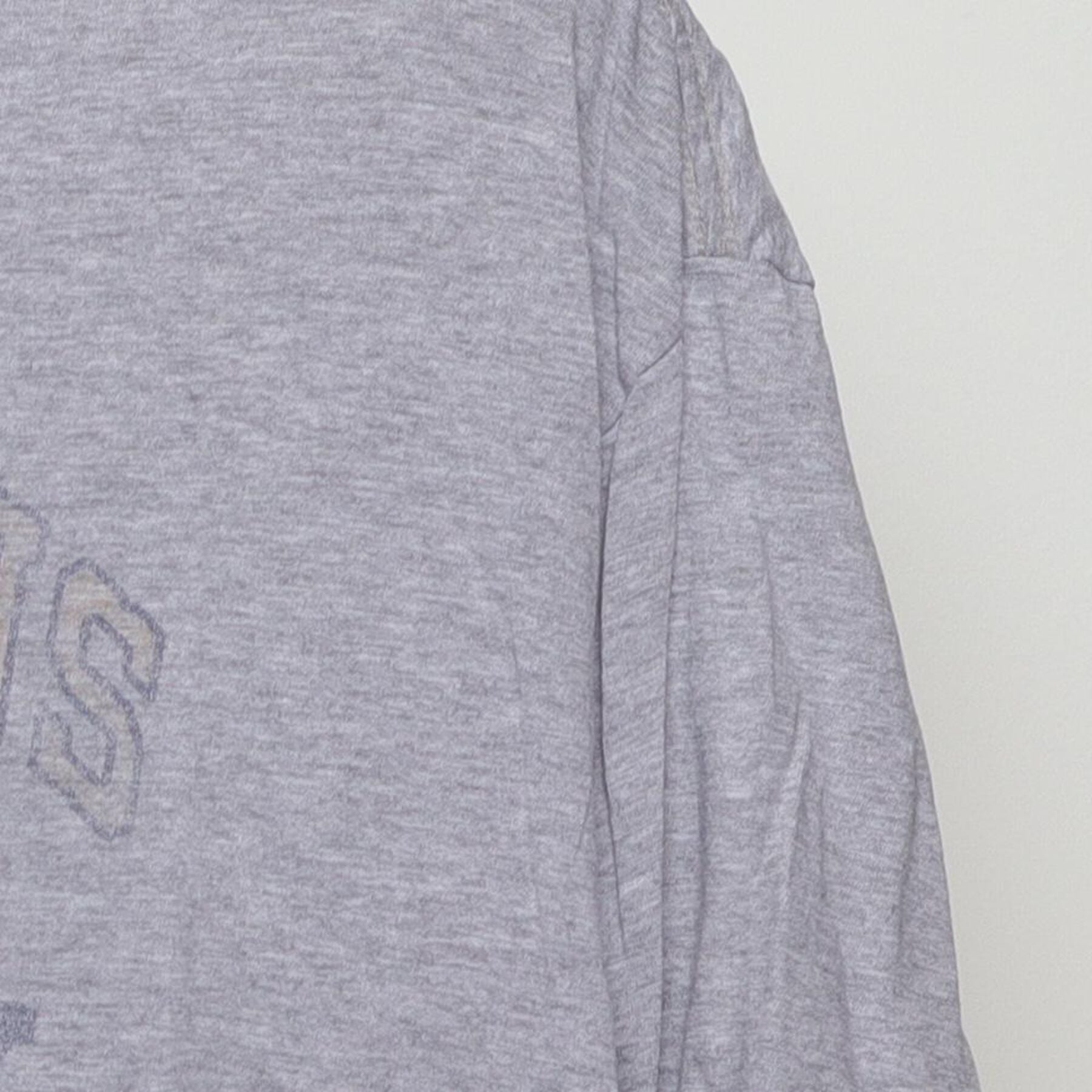 Close-up of the Right sleeve on the Vintage Y2K Polo Jeans Co. "Company Logo" T-Shirt - L