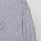 Close-up of the Right sleeve on the Vintage Y2K Polo Jeans Co. "Company Logo" T-Shirt - L