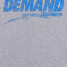 Close-up of the main graphic on the Vintage Y2K Popular Demand "Popular Demand" T-Shirt - XS