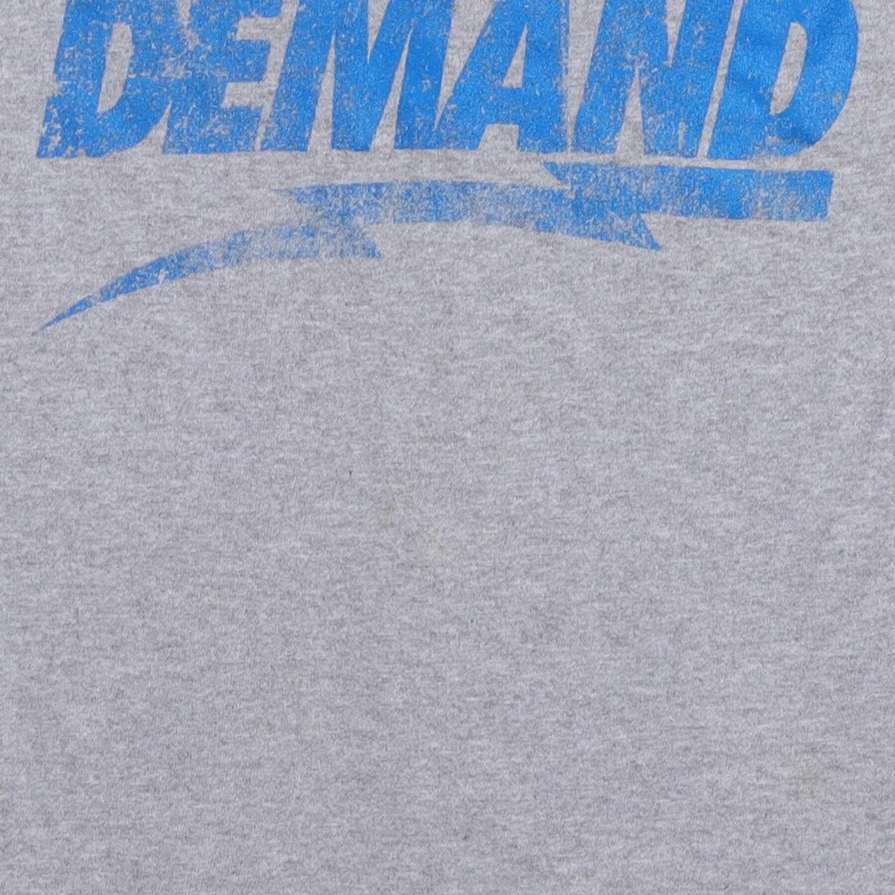Close-up of the main graphic on the Vintage Y2K Popular Demand "Popular Demand" T-Shirt - XS