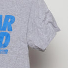 Close-up of the Right sleeve on the Vintage Y2K Popular Demand "Popular Demand" T-Shirt - XS