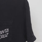 Close-up of the sleeve on the Vintage Y2K Santa Cruz "Sunset Dot Logo" T-Shirt - M