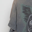 Close-up of the sleeve on the Vintage Y2K Skull "Gambler Skull" T-Shirt - L