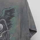 Close-up of the sleeve on the Vintage Y2K Skull "Gambler Skull" T-Shirt - L