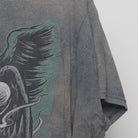 Close-up of the sleeve on the Vintage Y2K Skull "Gambler Skull" T-Shirt - L