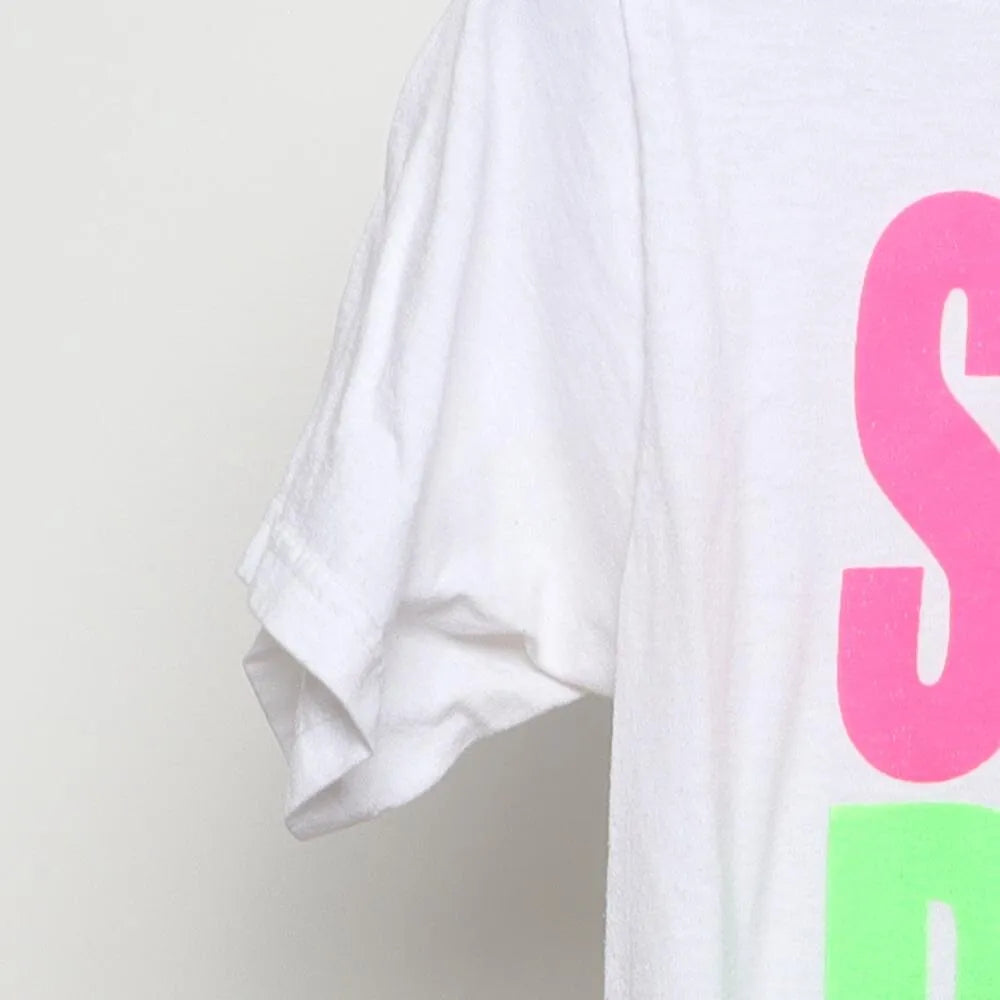 Close-up of the sleeve on the Vintage Y2K Spring Break "2008 Neon" T-Shirt - XS