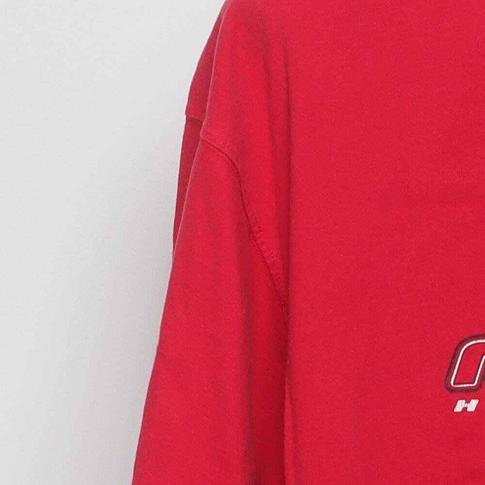 Close-up of the sleeve on the Vintage Y2K Starter Nebraska Huskers "Big N Logo" T-Shirt - XL