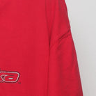 Close-up of the sleeve on the Vintage Y2K Starter Nebraska Huskers "Big N Logo" T-Shirt - XL