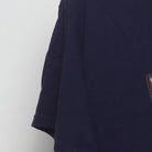 Close-up of the sleeve on the Vintage Y2K The Three Stooges "Can't We All Just Get Along?" T-Shirt - L