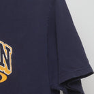 Close-up of the sleeve on the Vintage Y2K University of Michigan "Dynasty vs Wanna-Be" T-Shirt - L