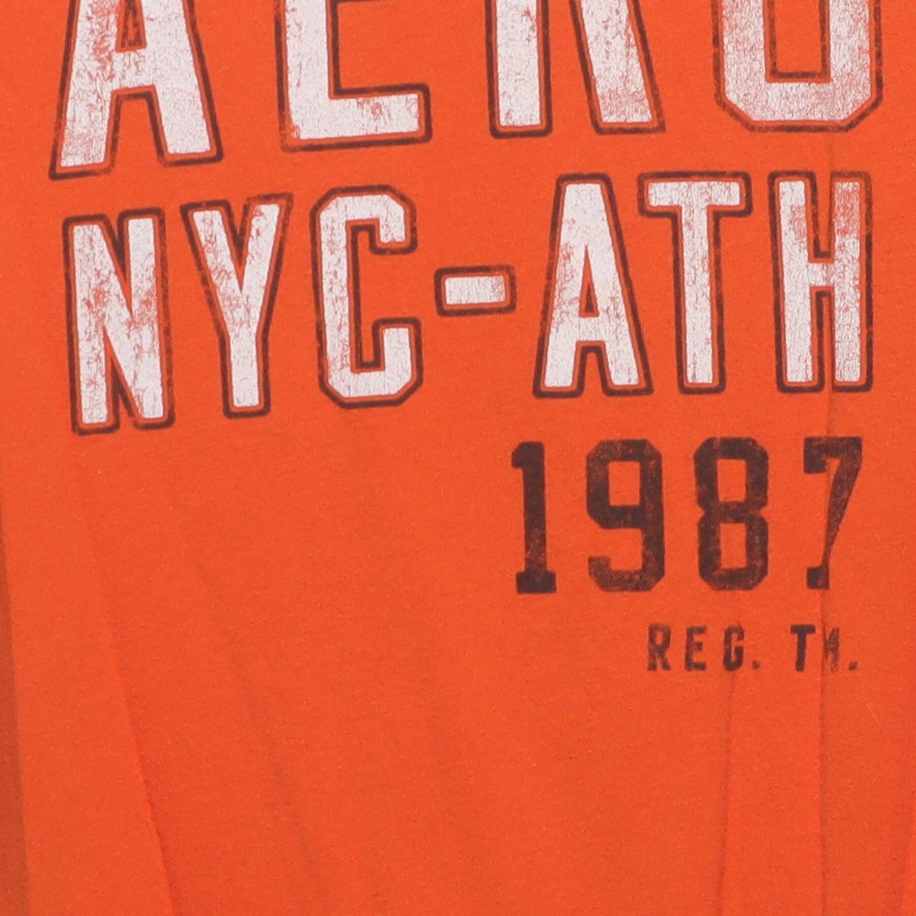 Close-up of the main graphic on the Vintage Y2K Aéropostale "AERO NYC-ATH 1987" T-Shirt - M